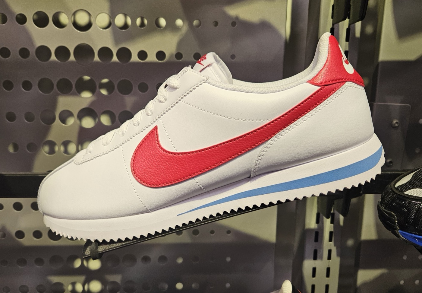 LeDroider (Wikimedia Commons) · CC0 Nike Bruins — red swoosh